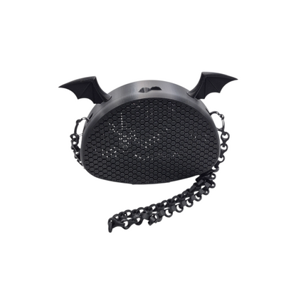 Black decorative handbag with bat wings and chain on a white background